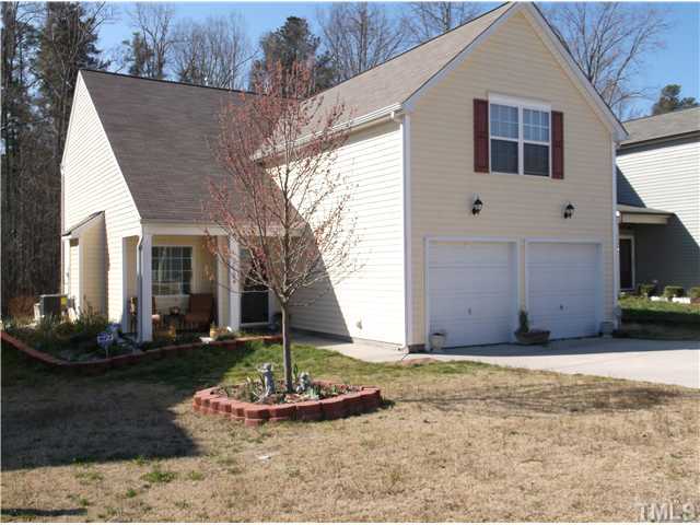 1124 Early Rise Street Raleigh, NC 27610 - Photo 1 of 5 a front view of a house with garden