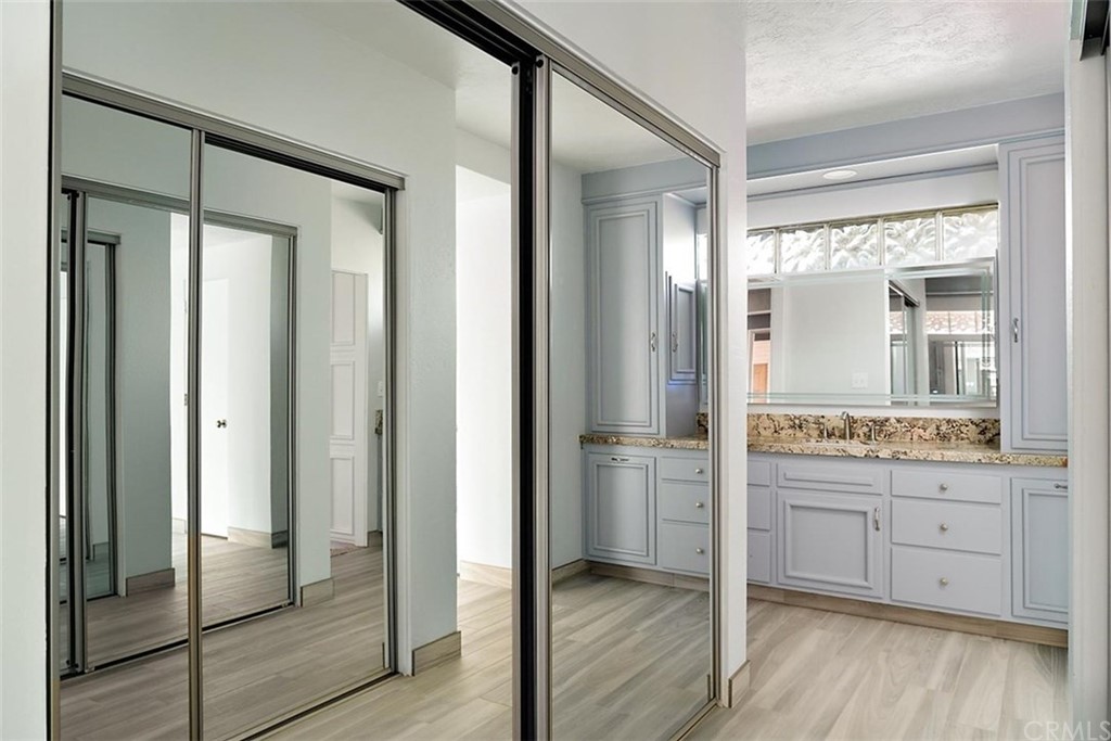 110 Nutwood Circle Paso Robles, CA 93446 - Photo 22 of 40 a bathroom with a double vanity sink mirror and shower