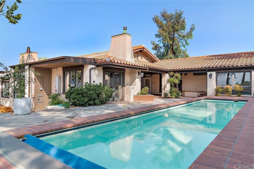 110 Nutwood Circle Paso Robles, CA 93446 - Photo 29 of 40 a front view of a house with swimming pool