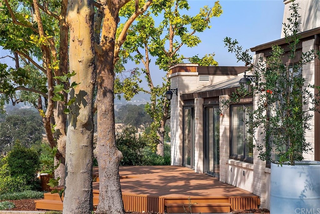 110 Nutwood Circle Paso Robles, CA 93446 - Photo 33 of 40 a view of a patio with a tree front of house