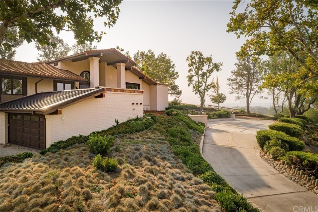 110 Nutwood Circle Paso Robles, CA 93446 - Photo 36 of 40 a white house that has tree in front of it