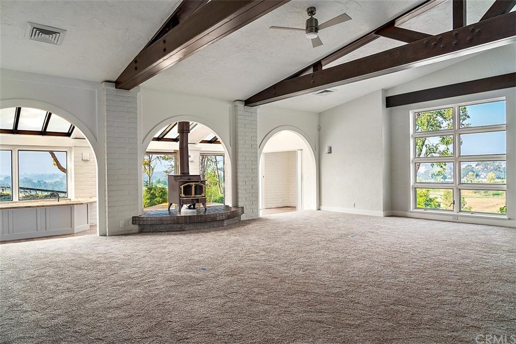 110 Nutwood Circle Paso Robles, CA 93446 - Photo 10 of 40 a view of empty room with large windows