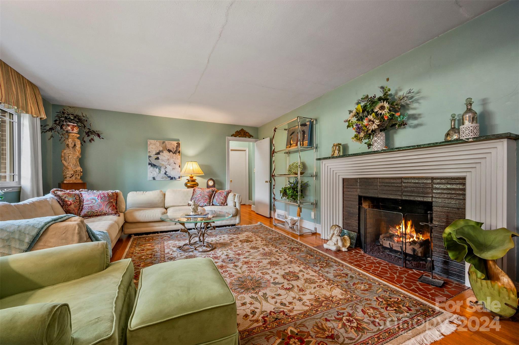 160 Tanner Street Rutherfordton, NC 28139 - Photo 5 of 35 a living room with furniture and a fireplace
