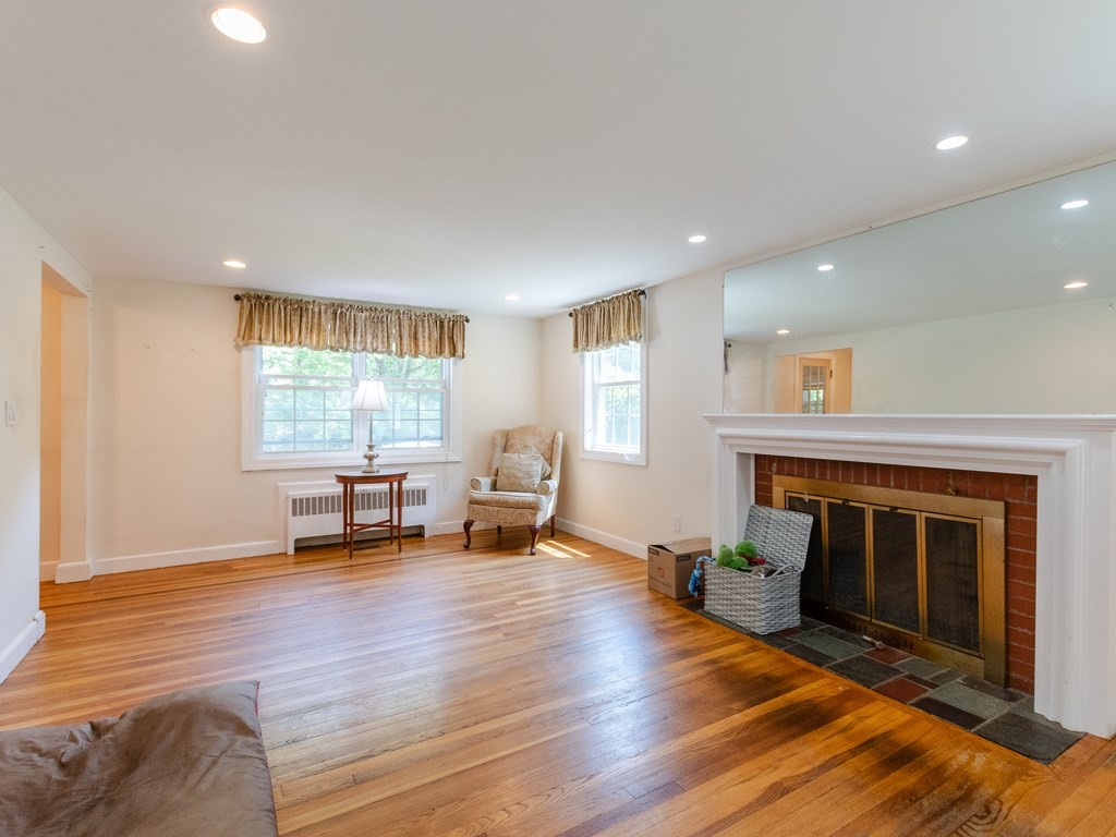 95 Blake Street Newton, MA 02460 - Photo 12 of 22 a view of living room with furniture and a fireplace