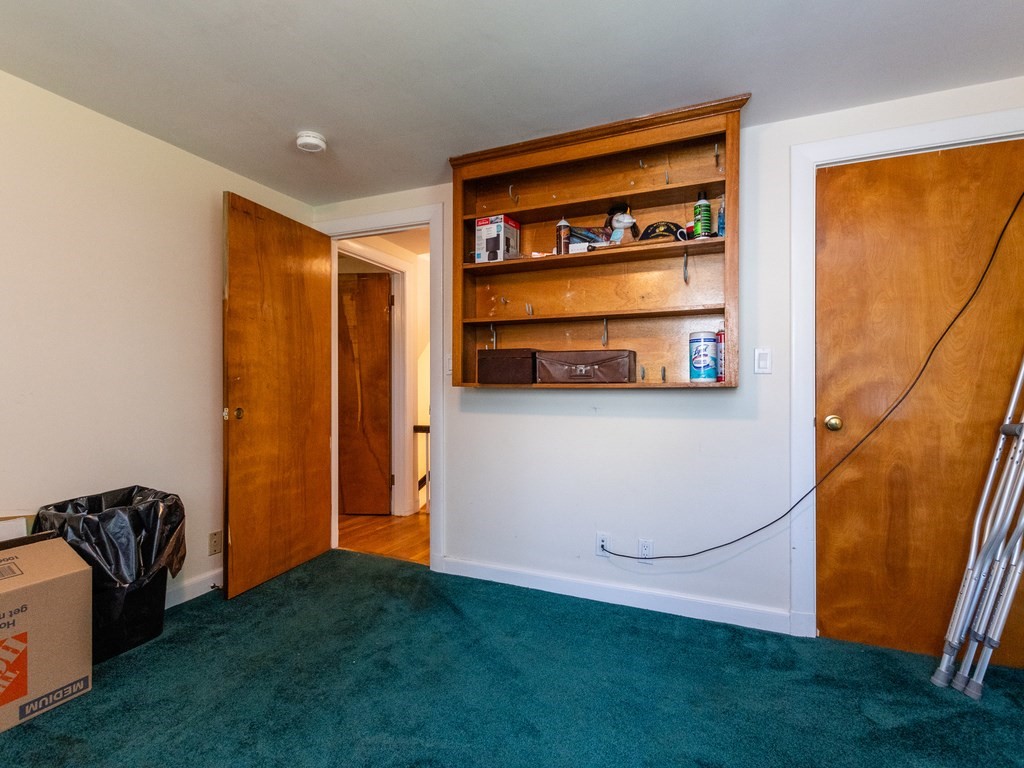 95 Blake Street Newton, MA 02460 - Photo 19 of 22 a view of an empty room with a window