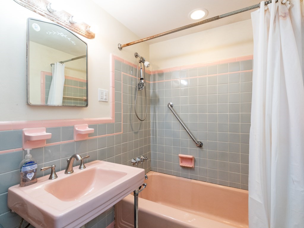 95 Blake Street Newton, MA 02460 - Photo 22 of 22 a bathroom with a sink mirror and a bathtub