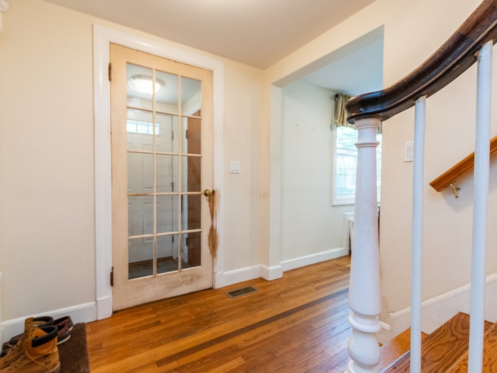 95 Blake Street Newton, MA 02460 - Photo 10 of 22 a view of empty room with wooden floor and fan