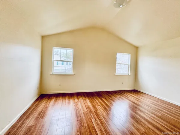 a view of a bathroom from a hallway
