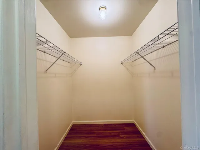 a view of a room with racks on the wall