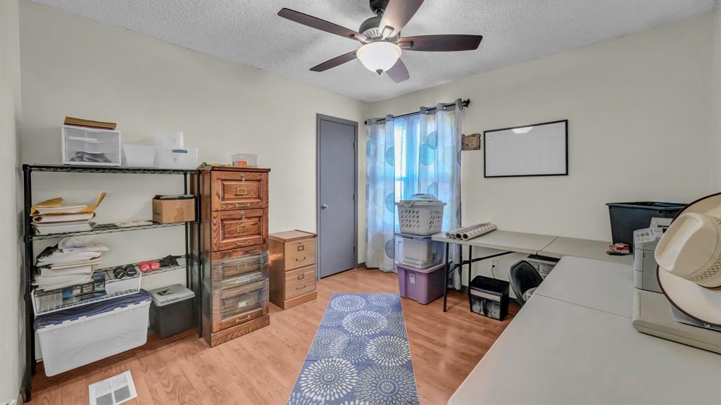 5808 Bunker Boulevard Watauga, TX 76148 - Photo 27 of 36 a living room with furniture and a window