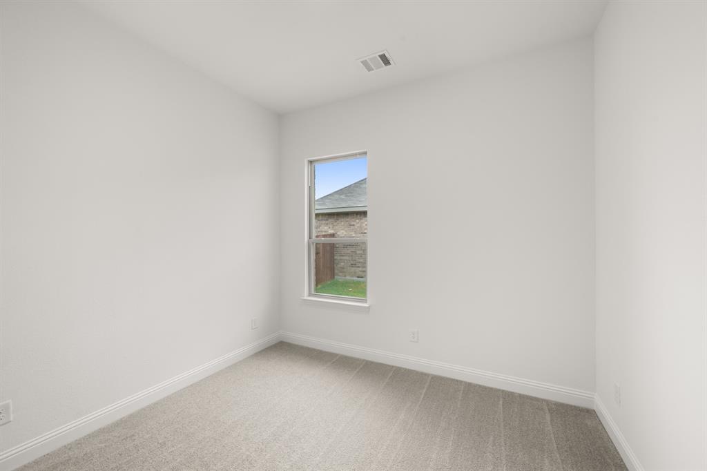 144 Trinity Street Grandview, TX 76050 - Photo 10 of 27 144 Trinity- Bedroom-3