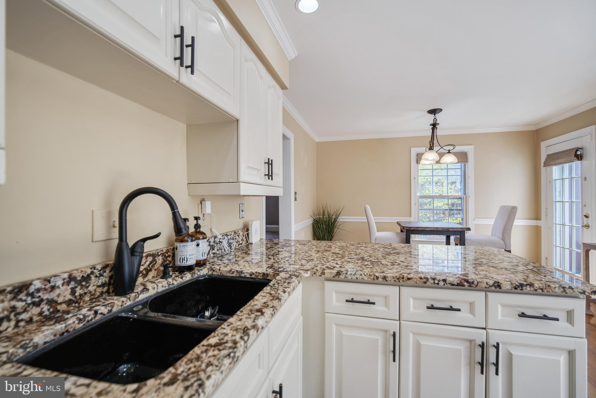 6528 Milva Lane Springfield, VA 22150 - Photo 13 of 35 Open kitchen with granite countertops