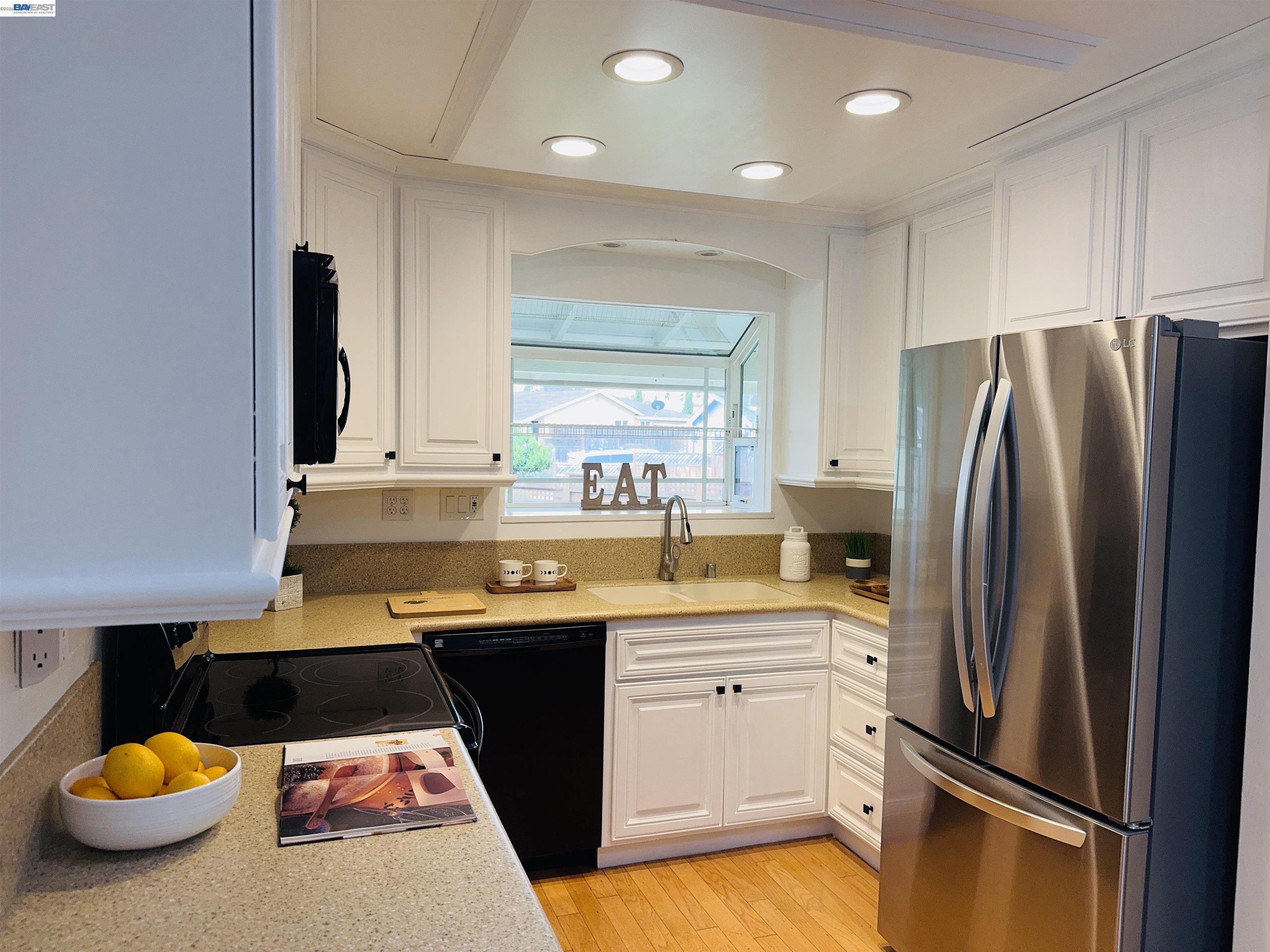 32301 Ruth Court Union City, CA 94587 - Photo 5 of 32 a kitchen with stainless steel appliances granite countertop a sink a stove and refrigerator