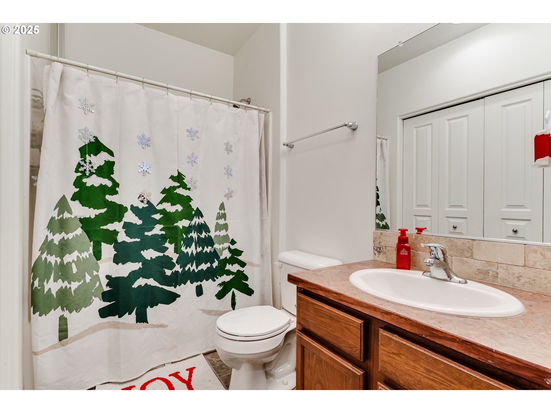 1565 Legacy Street Eugene, OR 97402 - Photo 14 of 27 a bathroom with a sink toilet and shower