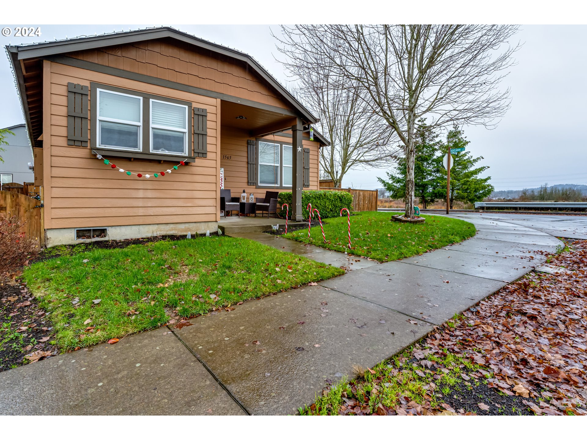 1565 Legacy Street Eugene, OR 97402 - Photo 2 of 27 a view of a house with a yard
