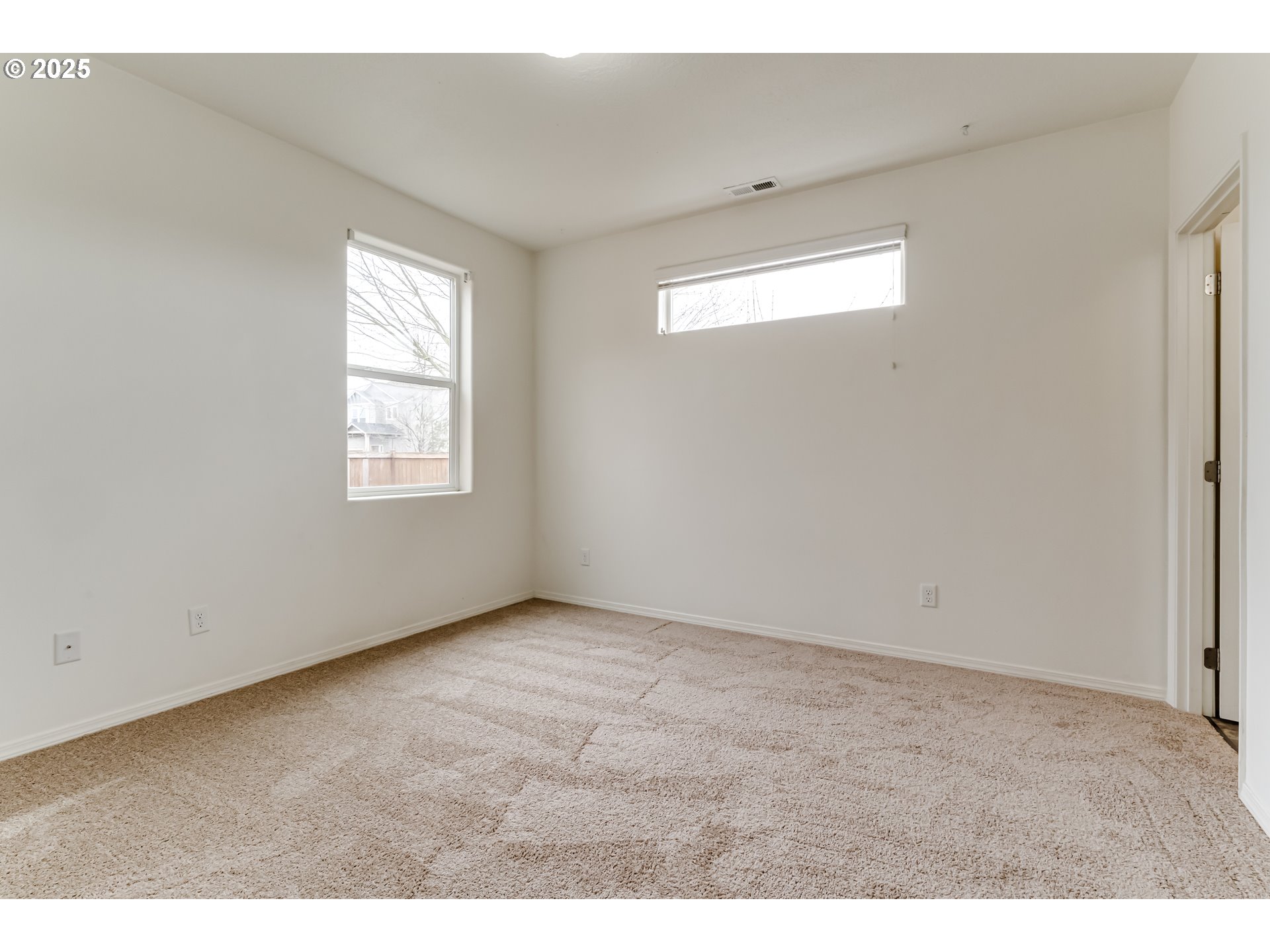 1565 Legacy Street Eugene, OR 97402 - Photo 22 of 27 a view of an empty room with a window