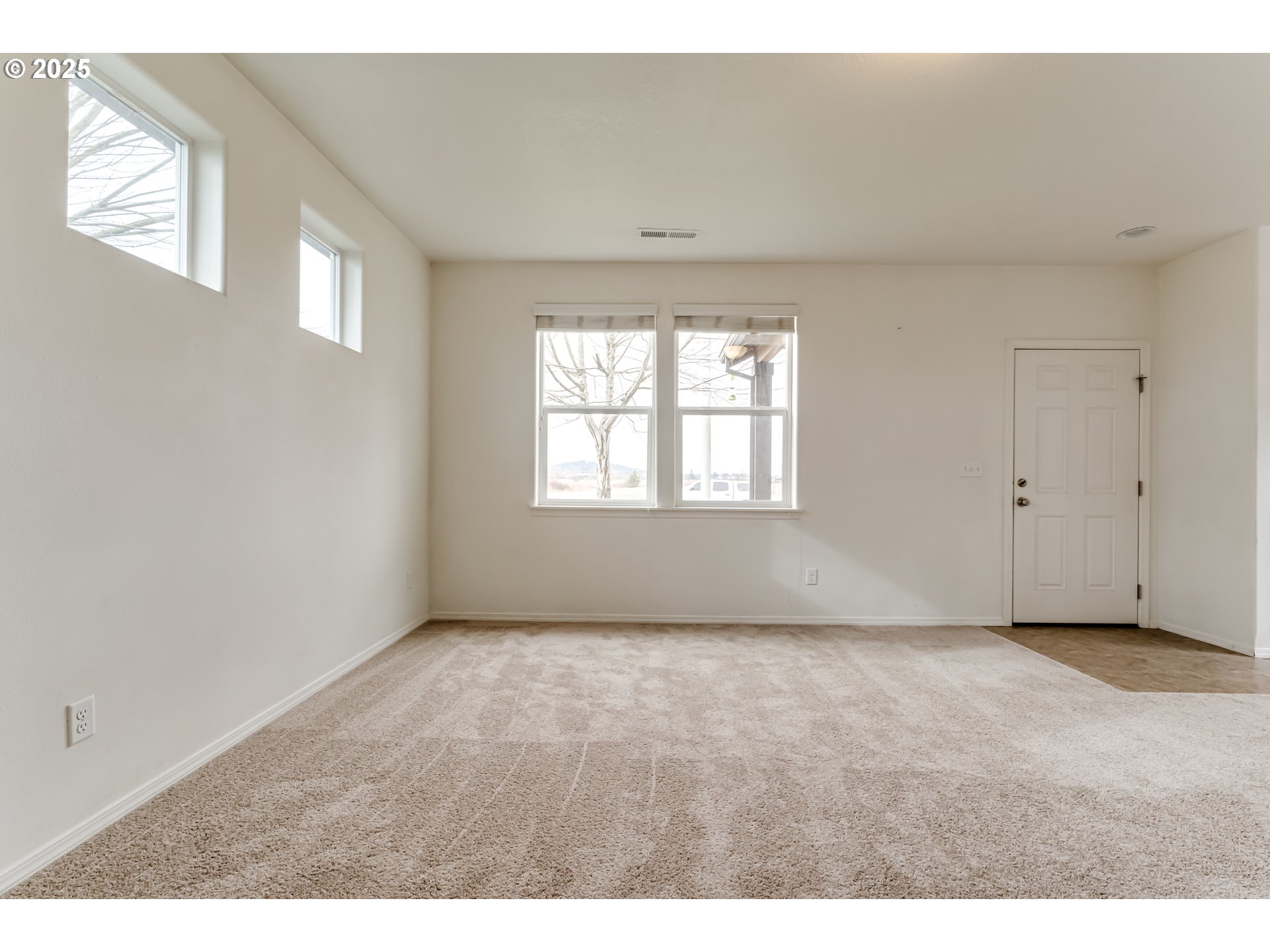 1565 Legacy Street Eugene, OR 97402 - Photo 5 of 27 a view of an empty room with a window