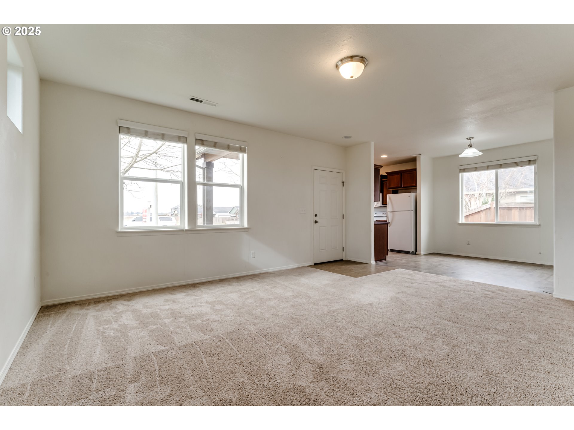 1565 Legacy Street Eugene, OR 97402 - Photo 6 of 27 a view of an empty room with a window