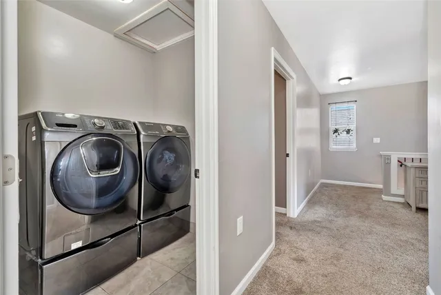 a view of a storage & utility room with racks on the wall