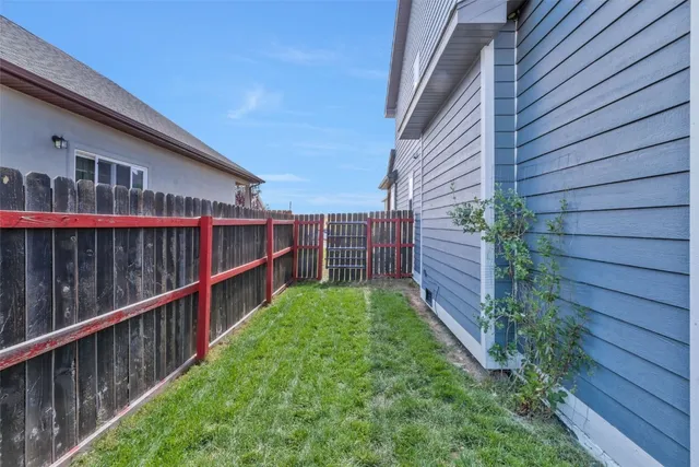 a view of backyard with green space