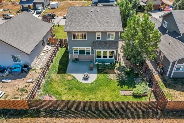 an aerial view of a house with garden