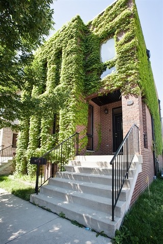 2828 South Lock Street Chicago, IL 60608 - Photo 1 of 21 a view of a house with a tree