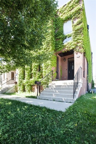 2828 South Lock Street Chicago, IL 60608 - Photo 21 of 21 a front view of a house with a yard