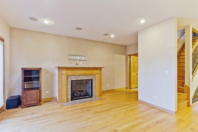 2828 South Lock Street Chicago, IL 60608 - Photo 8 of 21 a view of an empty room with a fireplace