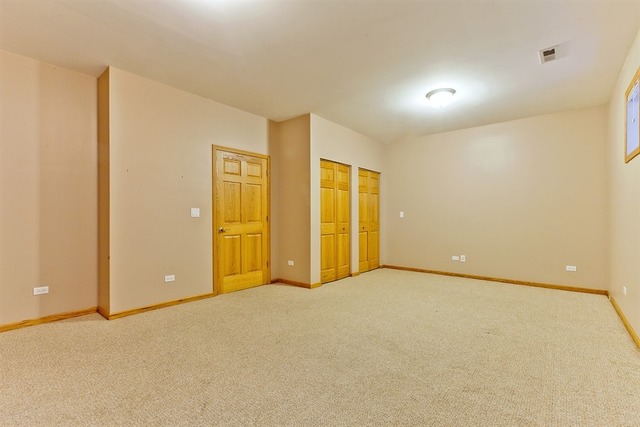 2828 South Lock Street Chicago, IL 60608 - Photo 9 of 21 a view of an empty room with wooden floor