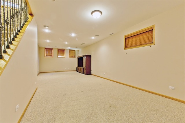 2828 South Lock Street Chicago, IL 60608 - Photo 10 of 21 an empty room with wooden floor