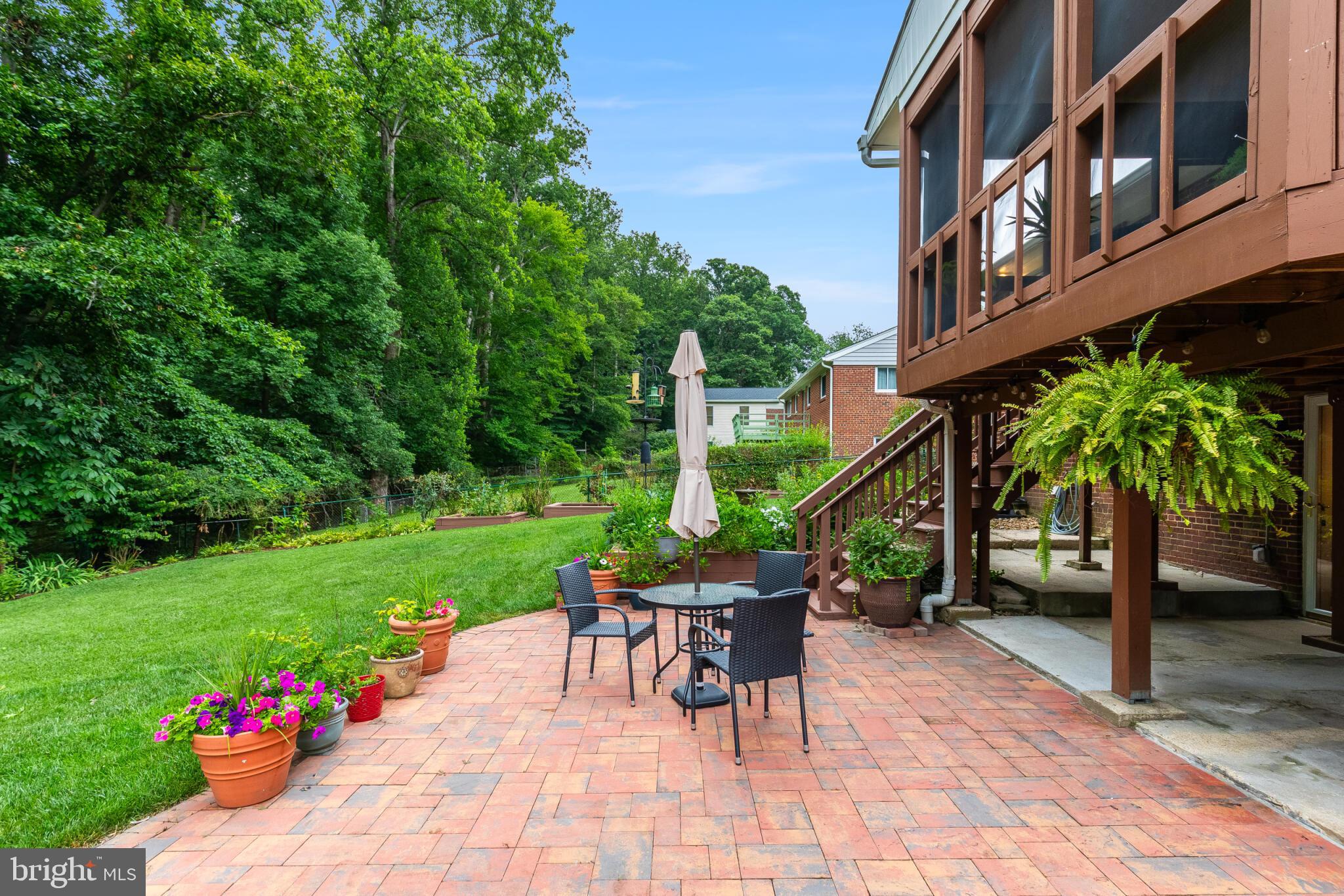 7504 Nancemond Street Springfield, VA 22150 - Photo 42 of 51 Brick patio beneath the deck