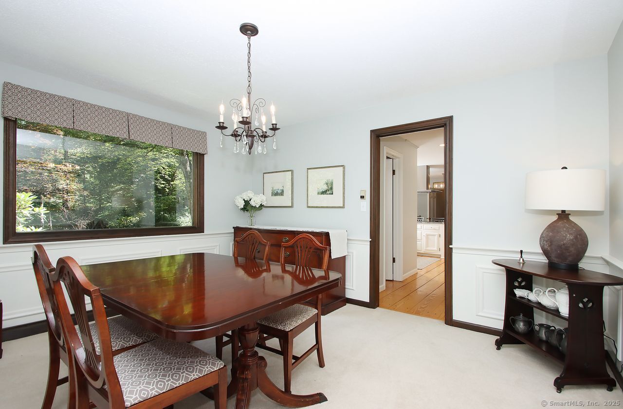 125 Wildcat Road Madison, CT 06443 - Photo 16 of 34 a view of a dining room with furniture window and outside view