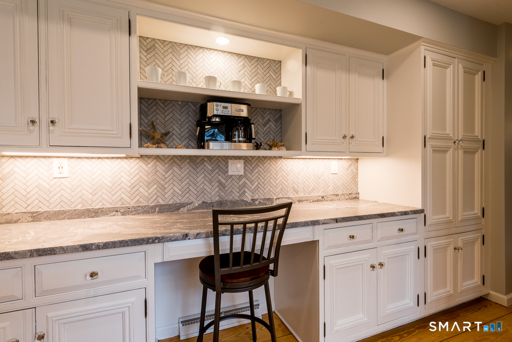 125 Wildcat Road Madison, CT 06443 - Photo 31 of 34 a kitchen with appliances cabinets and a counter top space