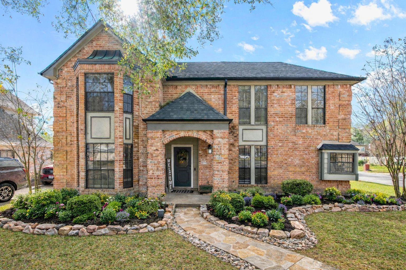 41 Windsor Drive Conroe, TX 77304 - Photo 1 of 39 Welcome to 41 Windsor Dr., Conroe, TX. This well-maintained brick home in the established Rivershire community offers mature trees, a peaceful setting, and strong curb appeal. Thoughtful updates throughout show the care that’s gone into this home. Let’s begin here. This home is ready for what’s next. (Landscaping enhanced to demonstrate potential curb appeal.)
