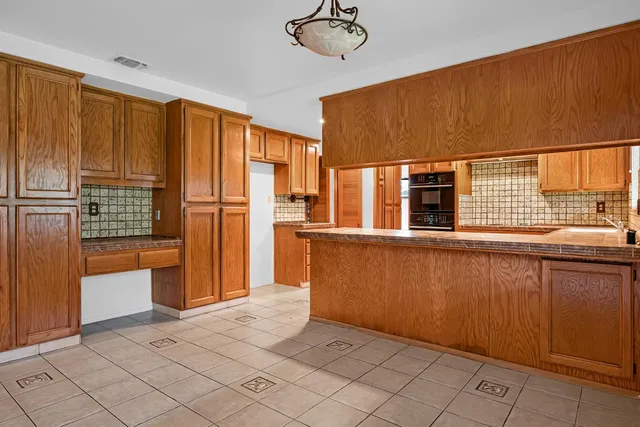 a view of kitchen with windows