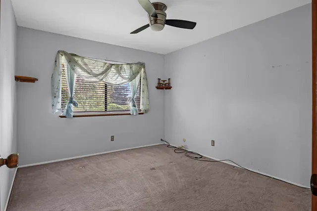 an empty room with window