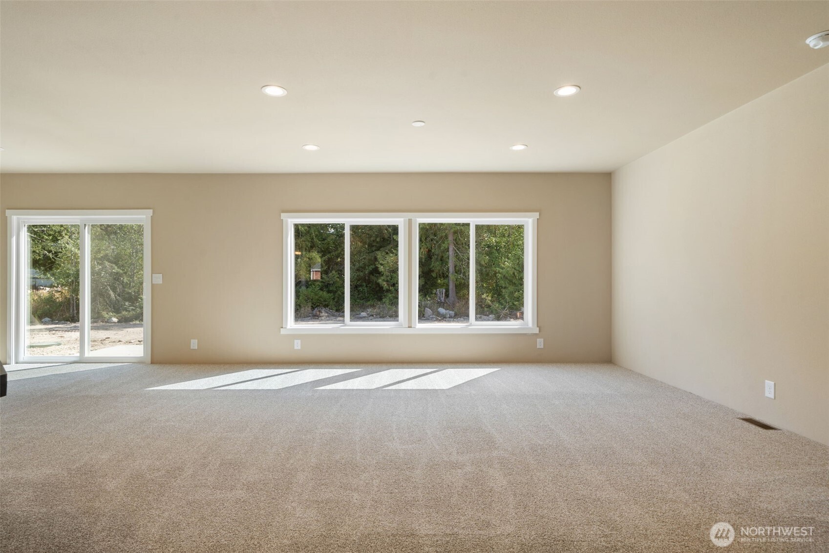 73 Butterfly Lane Sequim, WA 98382 - Photo 11 of 34 a view of an empty room with a window