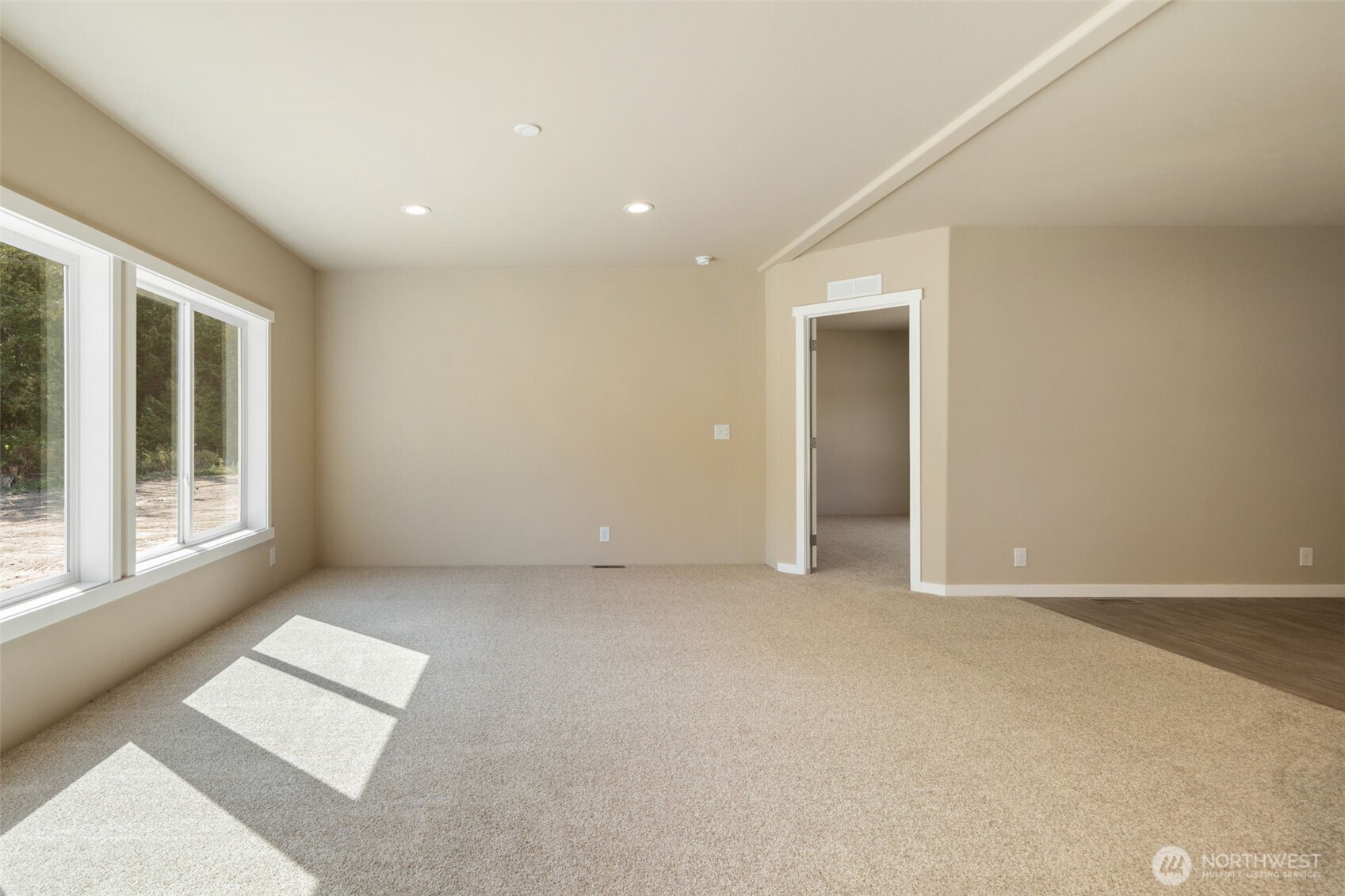 73 Butterfly Lane Sequim, WA 98382 - Photo 14 of 34 a view of an empty room with a window