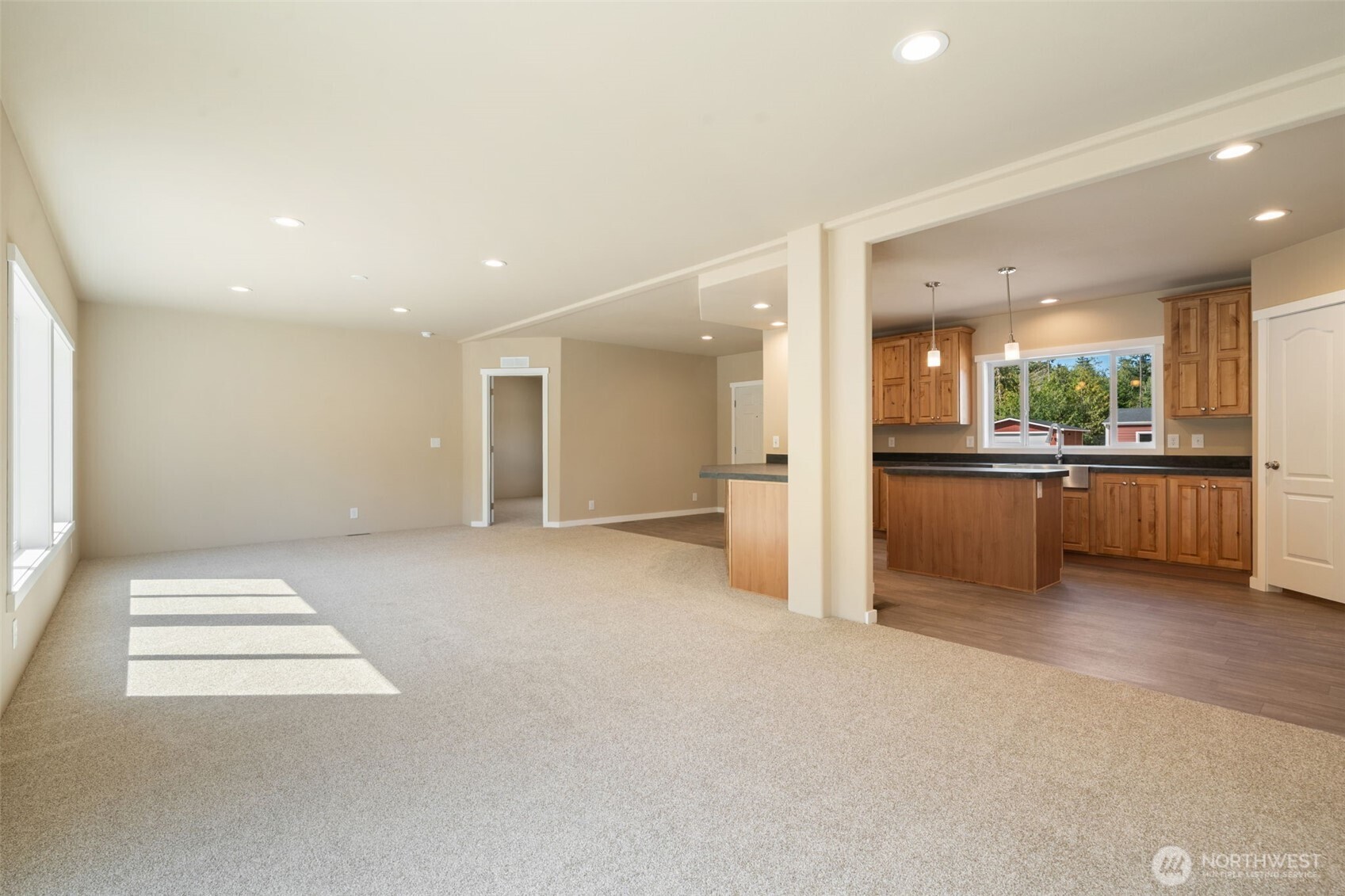 73 Butterfly Lane Sequim, WA 98382 - Photo 17 of 34 a view of an empty room with a kitchen