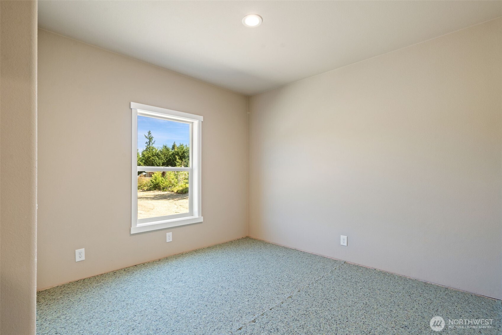73 Butterfly Lane Sequim, WA 98382 - Photo 19 of 34 an empty room with windows