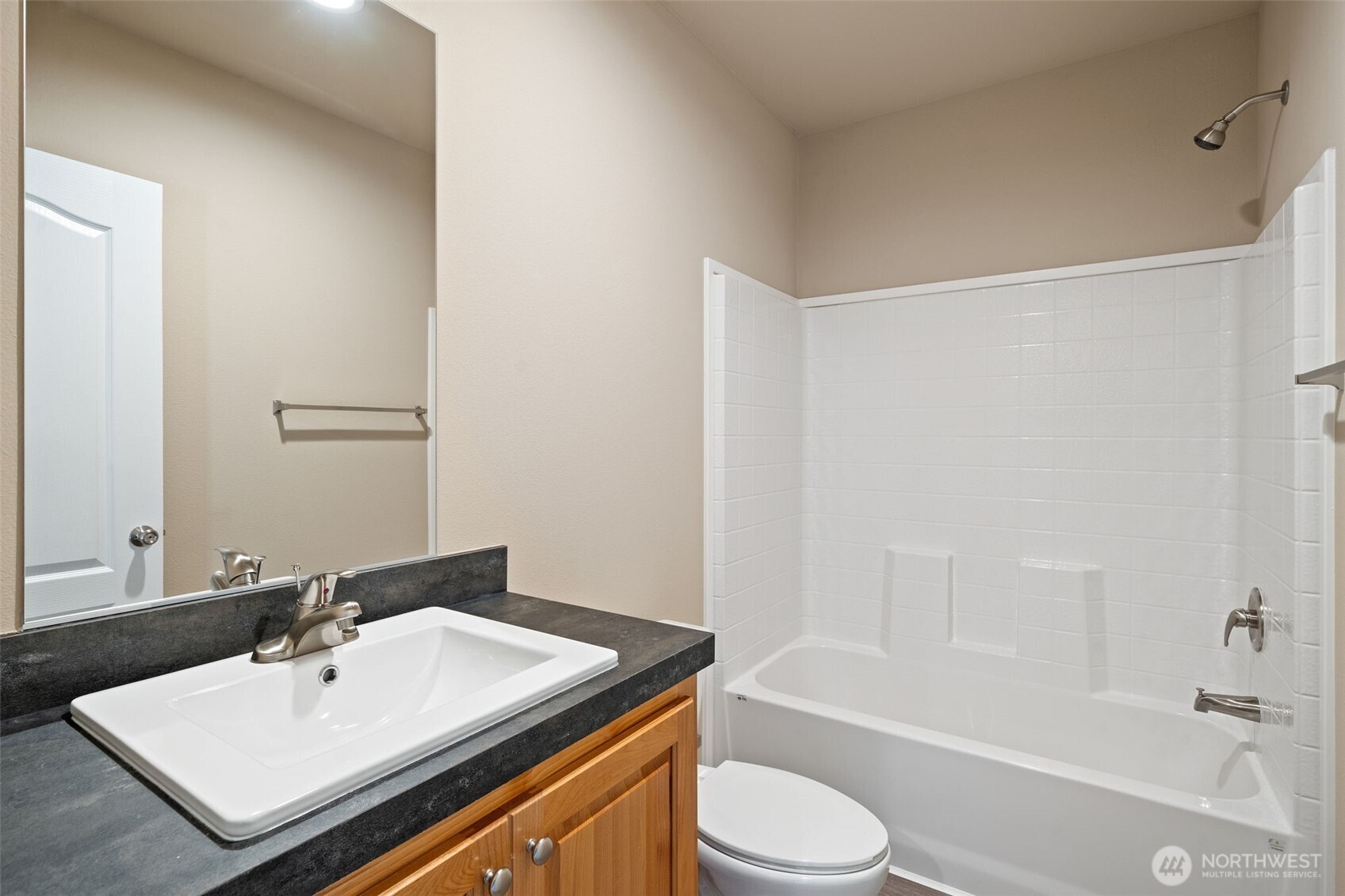 73 Butterfly Lane Sequim, WA 98382 - Photo 23 of 34 a bathroom with a sink toilet and bathtub