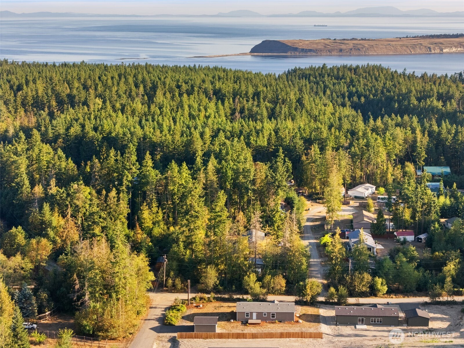 73 Butterfly Lane Sequim, WA 98382 - Photo 33 of 34 a view of a city with tall buildings