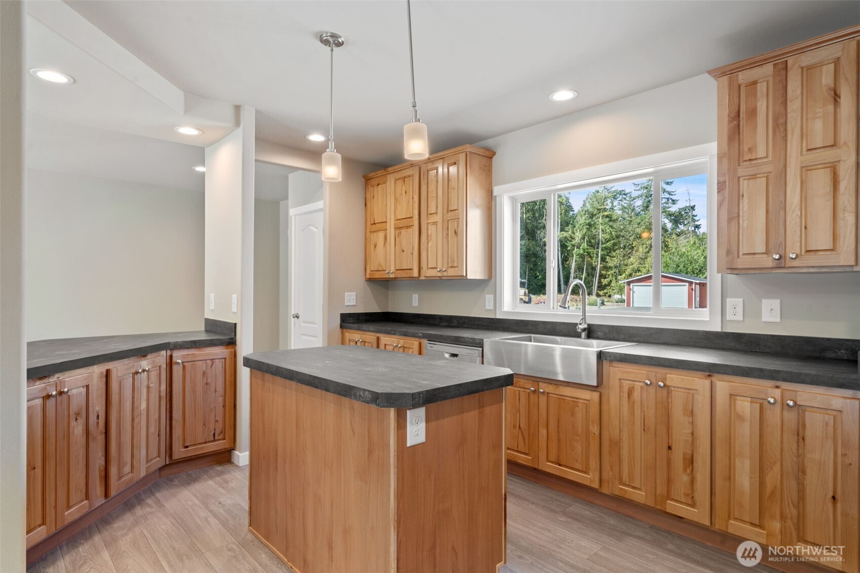 73 Butterfly Lane Sequim, WA 98382 - Photo 8 of 34 a kitchen that has a sink a window and appliances