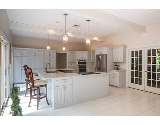 54 Bigelow Drive Sudbury, MA 01776 - Photo 17 of 40 a open kitchen with cabinets a sink and appliances