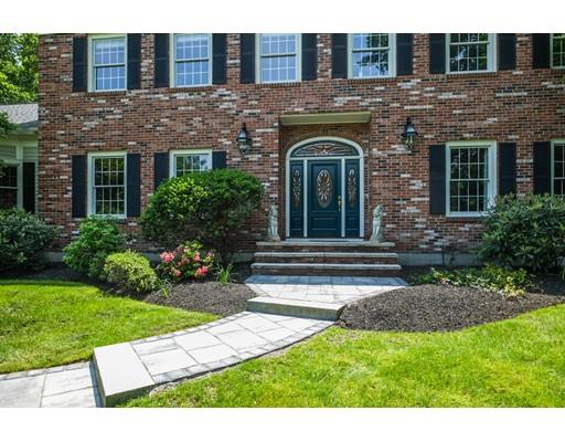 54 Bigelow Drive Sudbury, MA 01776 - Photo 2 of 40 a front view of a house with garden