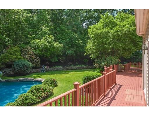 54 Bigelow Drive Sudbury, MA 01776 - Photo 25 of 40 a view of a wooden deck with a yard