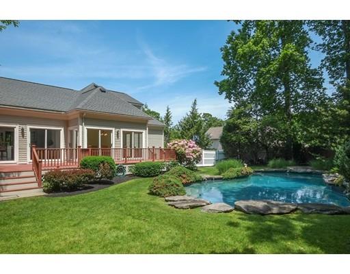 54 Bigelow Drive Sudbury, MA 01776 - Photo 27 of 40 a front view of a house with a yard