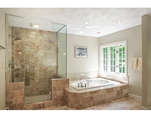 54 Bigelow Drive Sudbury, MA 01776 - Photo 33 of 40 a bathroom with a bath tub a sink and shower