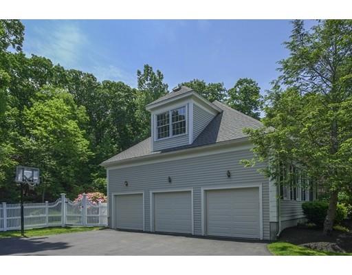 54 Bigelow Drive Sudbury, MA 01776 - Photo 40 of 40 a front view of a house with garden