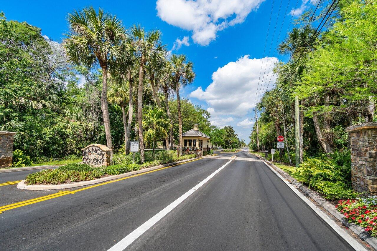 3200 Southeast Downwinds Road Jupiter, FL 33478 - Photo 27 of 28 a view of a street with a building in the background